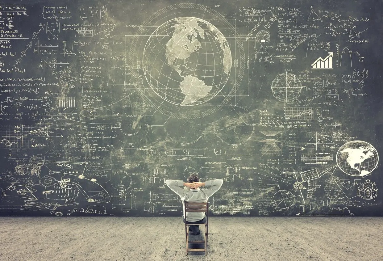 A globe mapped across a strategic planning wall